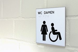 Türschild ILIS business line mit taktiler Schrift und Piktogramm